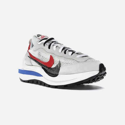 nike vaporwaffle sacai sport fuchsia game royal