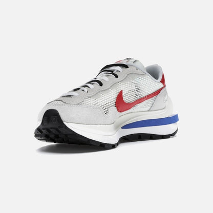 nike vaporwaffle sacai sport fuchsia game royal