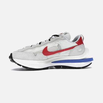 nike vaporwaffle sacai sport fuchsia game royal