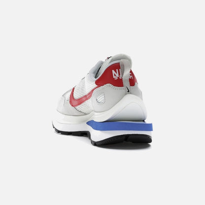 nike vaporwaffle sacai sport fuchsia game royal