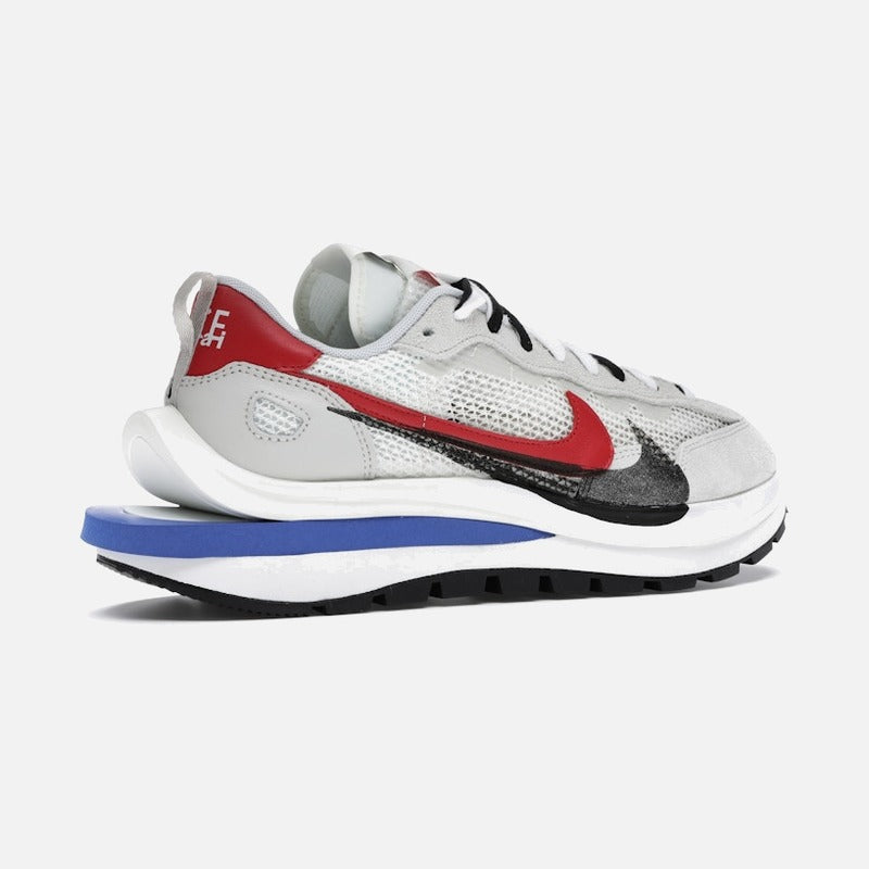nike vaporwaffle sacai sport fuchsia game royal