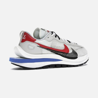 nike vaporwaffle sacai sport fuchsia game royal