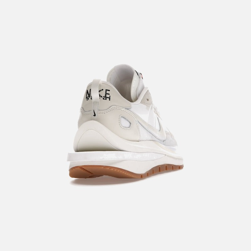nike vaporwaffle sacai sail gum