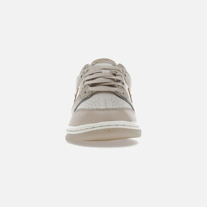Nike dunk low phantom metallic gold (w)